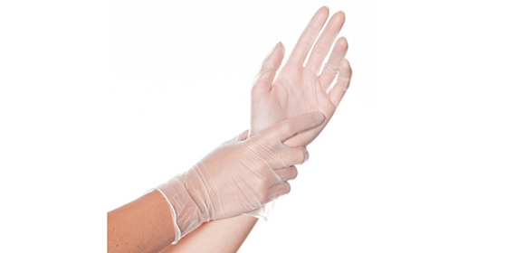 vinylhandskar på händer